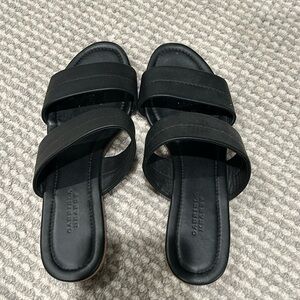 Black leather flat sandals by Gabriela Hearst. Size 37 EU/7 US.